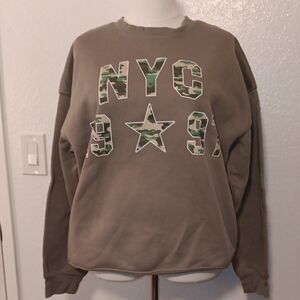 Wound Up Army Green Sweatshirt with Camouflage NYC Design